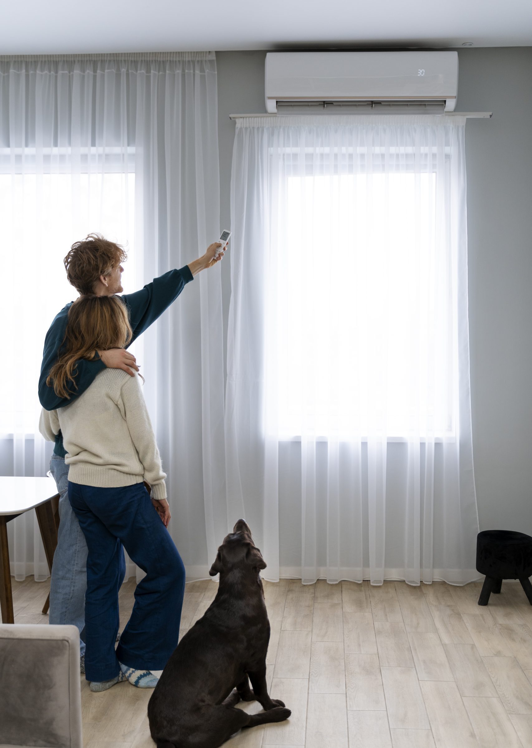 full shot couple dog home scaled e1742798607155